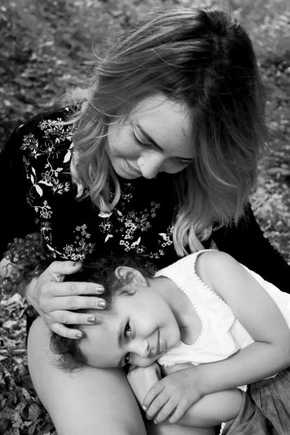 Black and white mother and daughter portrait